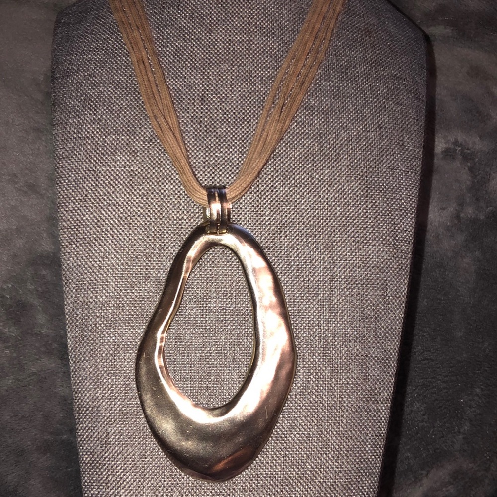 Karma Bella long drop necklace in gold tone and tan cording
